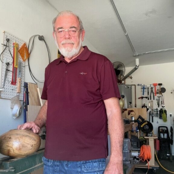 Al the woodworker in his shop